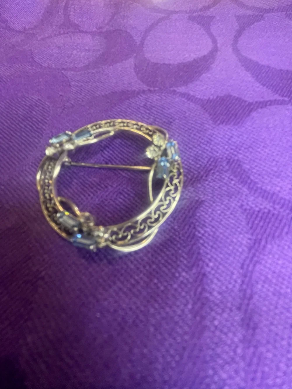 Gold-Tone Celtic Circle Brooch with Clear Stone Accents